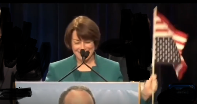 Klobuchar Waves Upside-Down American Flag to Somali Crowd — Media Yawns