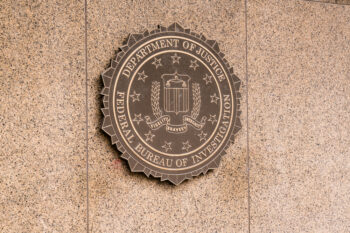 WASHINGTON, DC - MARCH 14, 2018: Seal of the Federal Bureau of Investigation on the J. Edgar Hoover FBI Building in Washington, DC